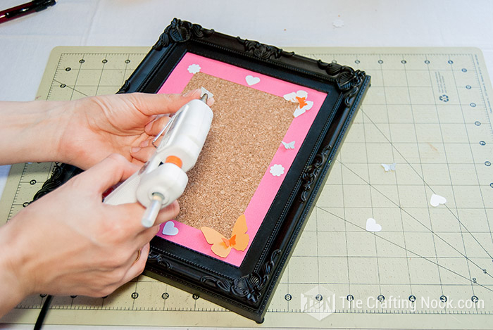 view of applying hot glue to the cute shapes