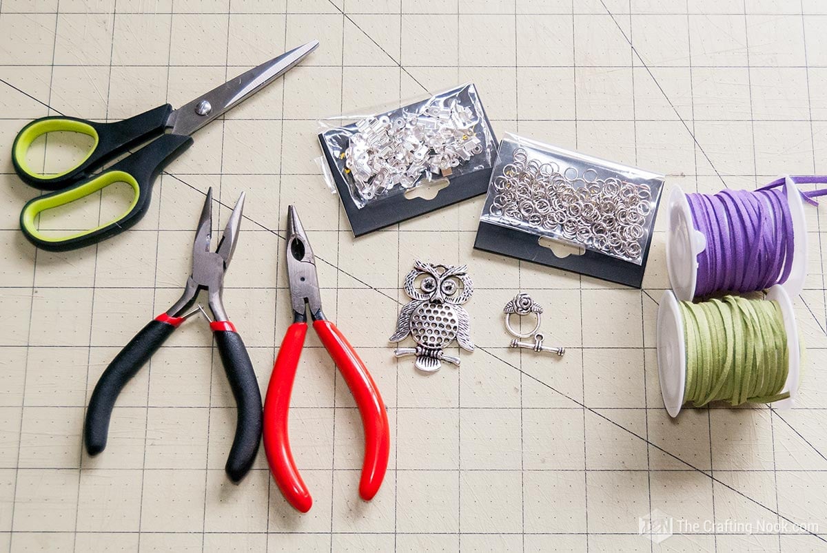 All the Supplies needed to create the Leather Cord Necklace DIY with Owl Pendant