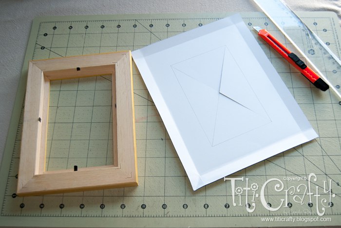  view of the wooden frame and paper to paste