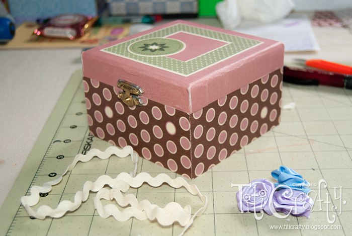  view of decorated wooden box and ribbon