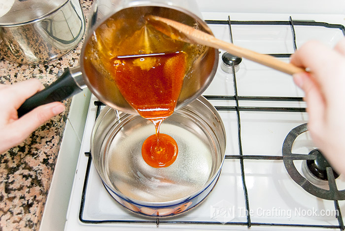 pouring the caramel into a metallic recipient