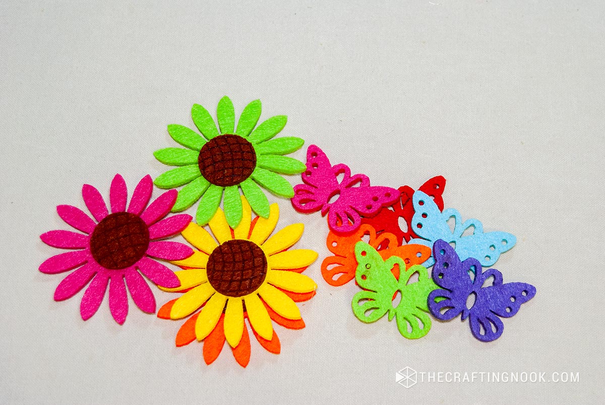 multicolored felt flowers and butterflies