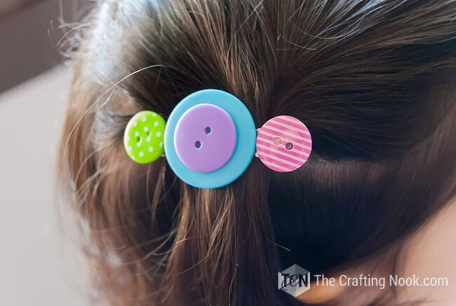 DIY Button Hair Clips on child head