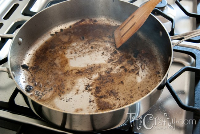 wide angle image of the frying pan with the remains of the meat juices
