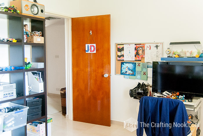 general view of DIY Name Door Sign With Mod Podge on bedroom doorviewed from inside