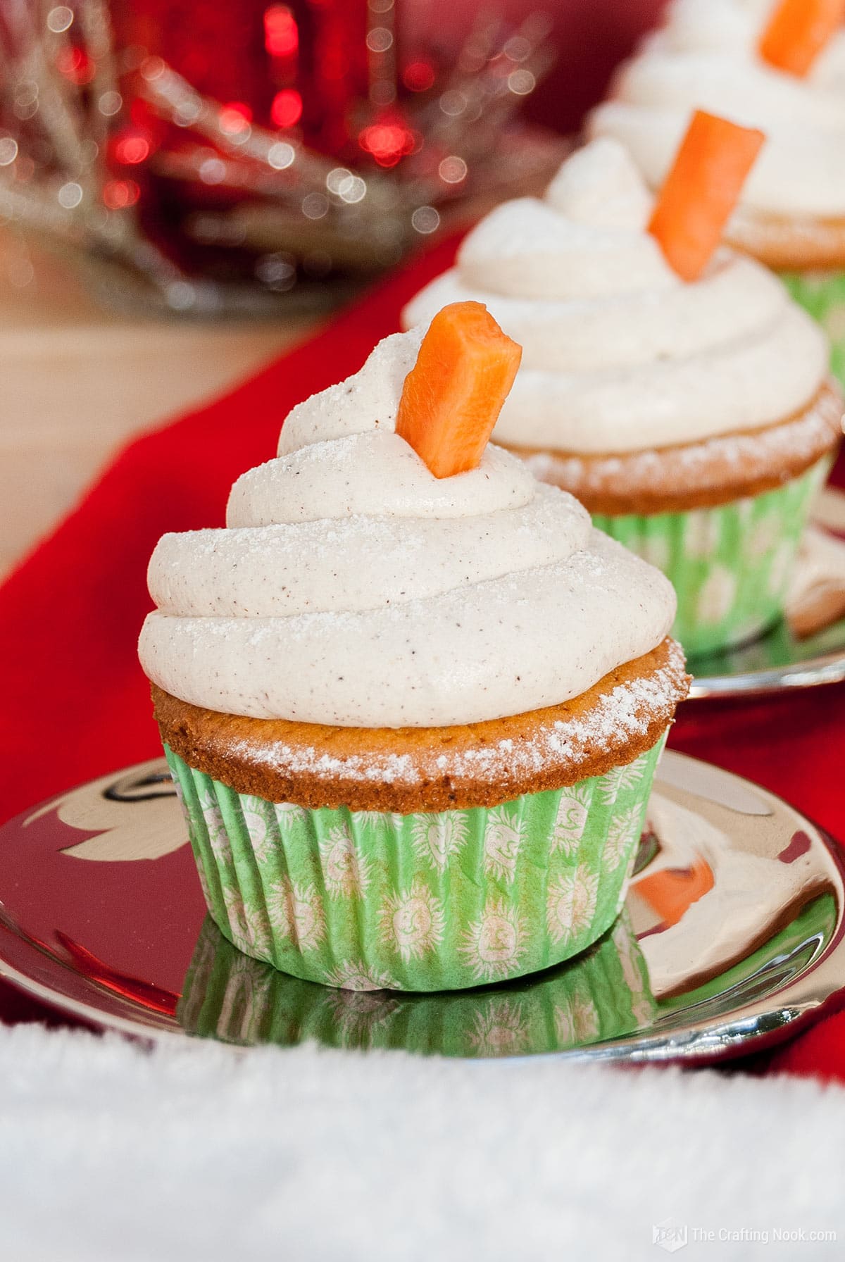 A closeup of the delicous Carrot Cake Cupcakes Recipewith Cinnamon Buttercream Frosting