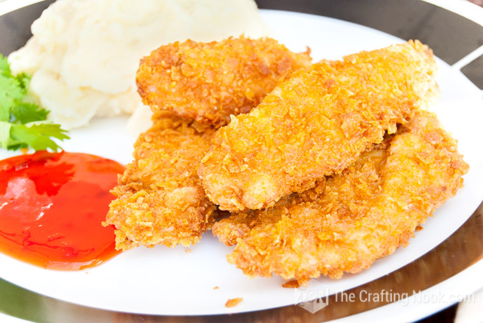 close up of view of  Corn Flakes Chicken Tender Strips done