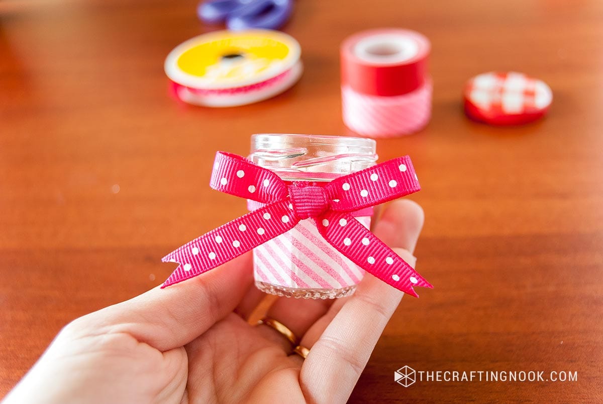 view of jar with washi tape and ribbon bow