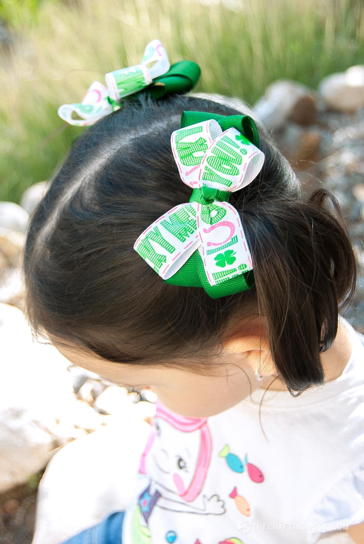 top view of hair with the diy no sew hair bows