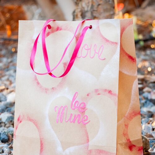 Wrapping paper bag for Valentine's Day on the ground cover image