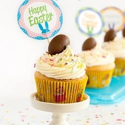 Almond Cupcakes with White Chocolate Frosting and Cadbury Creme Egg Topping + Free Cupcakes Toppers Printable