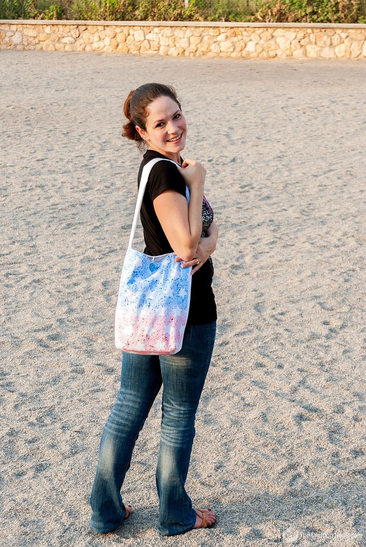 view of me wearing the DIY Patriotic Tote Bag with Toothbrush Painting