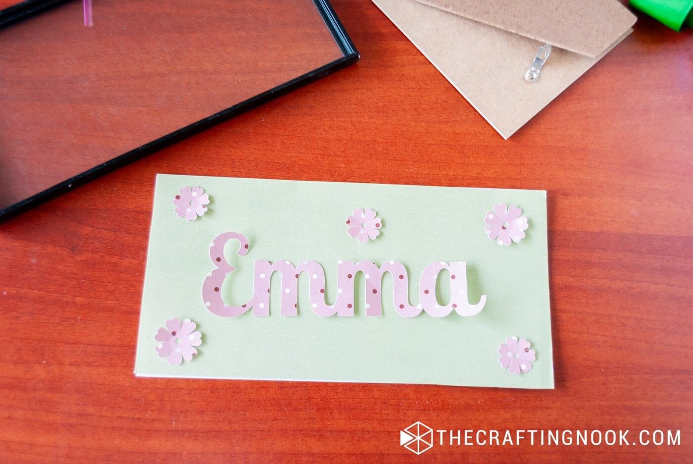 showing the girl's name and some pretty flowers cut with the silhouette machine.
