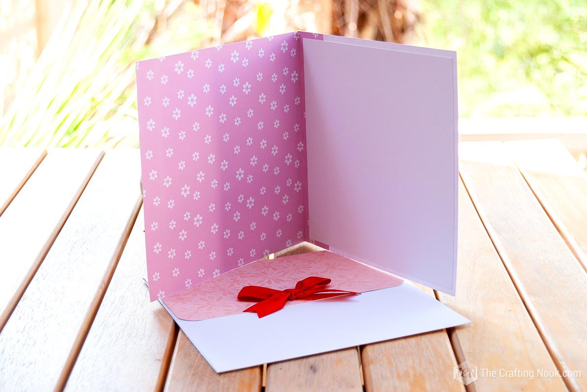 showing the inside of the card standing on a custom made envelope
