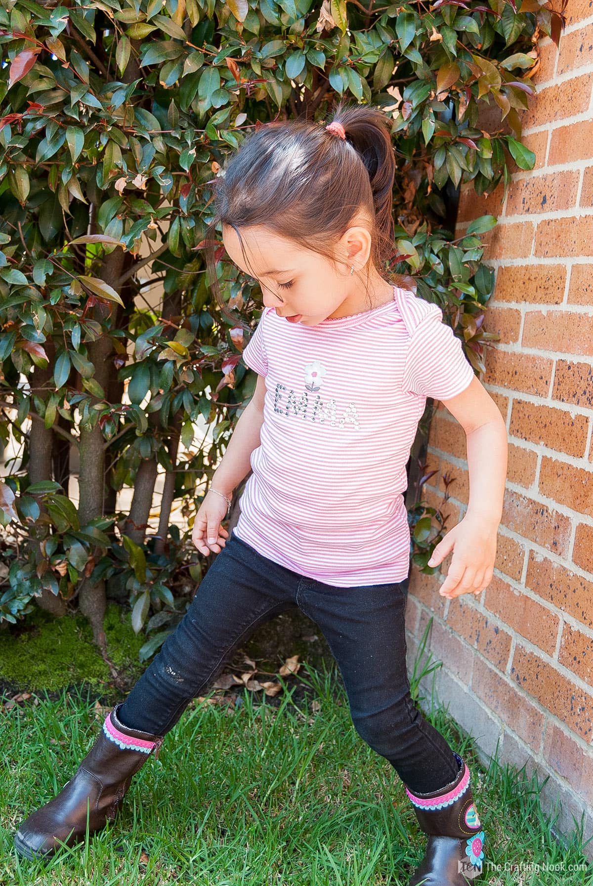 Girl front wearing Onesies turned into T-Shirts