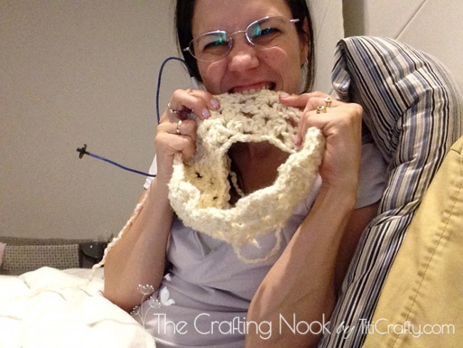 me biting the crochet fabric