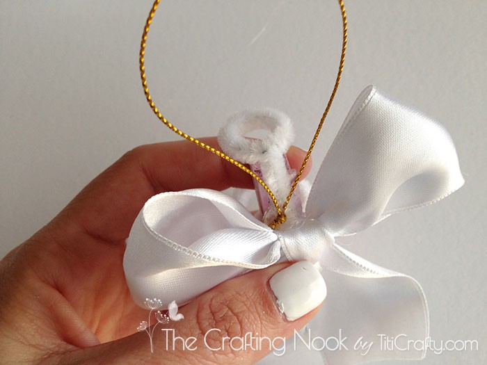 placing gold ribbon behind the Clothespin Angel Ornaments