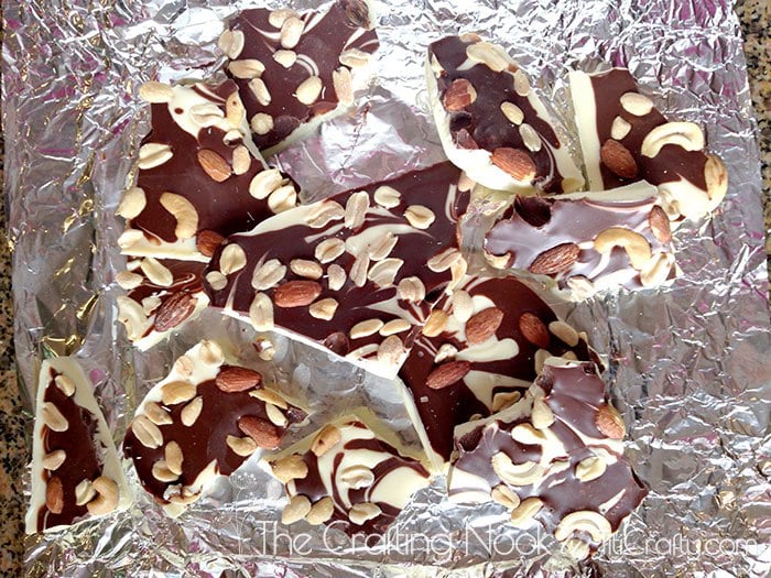 top view hand cut chocolate chunks with seeds
