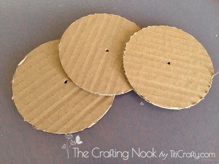 showing three cardboard circles