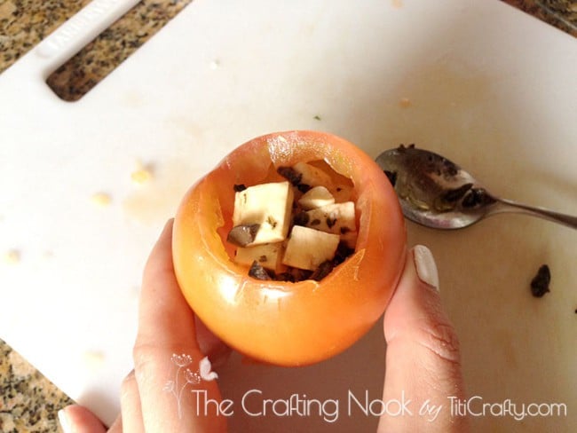 view of tomato with the mixture inside