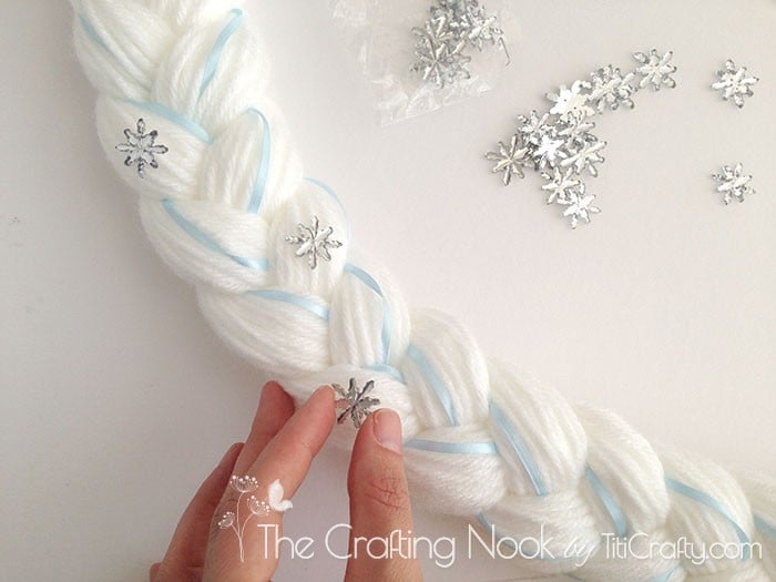 some snowflake buttons to the braid