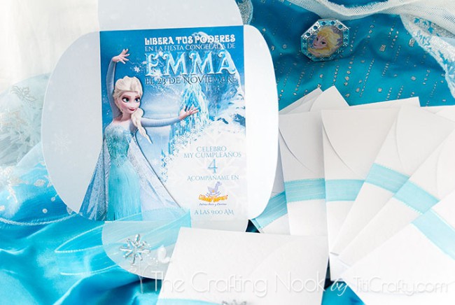 closer view of the Frozen Themed Party Invitations snowflake ready, on Elsa's outfit
