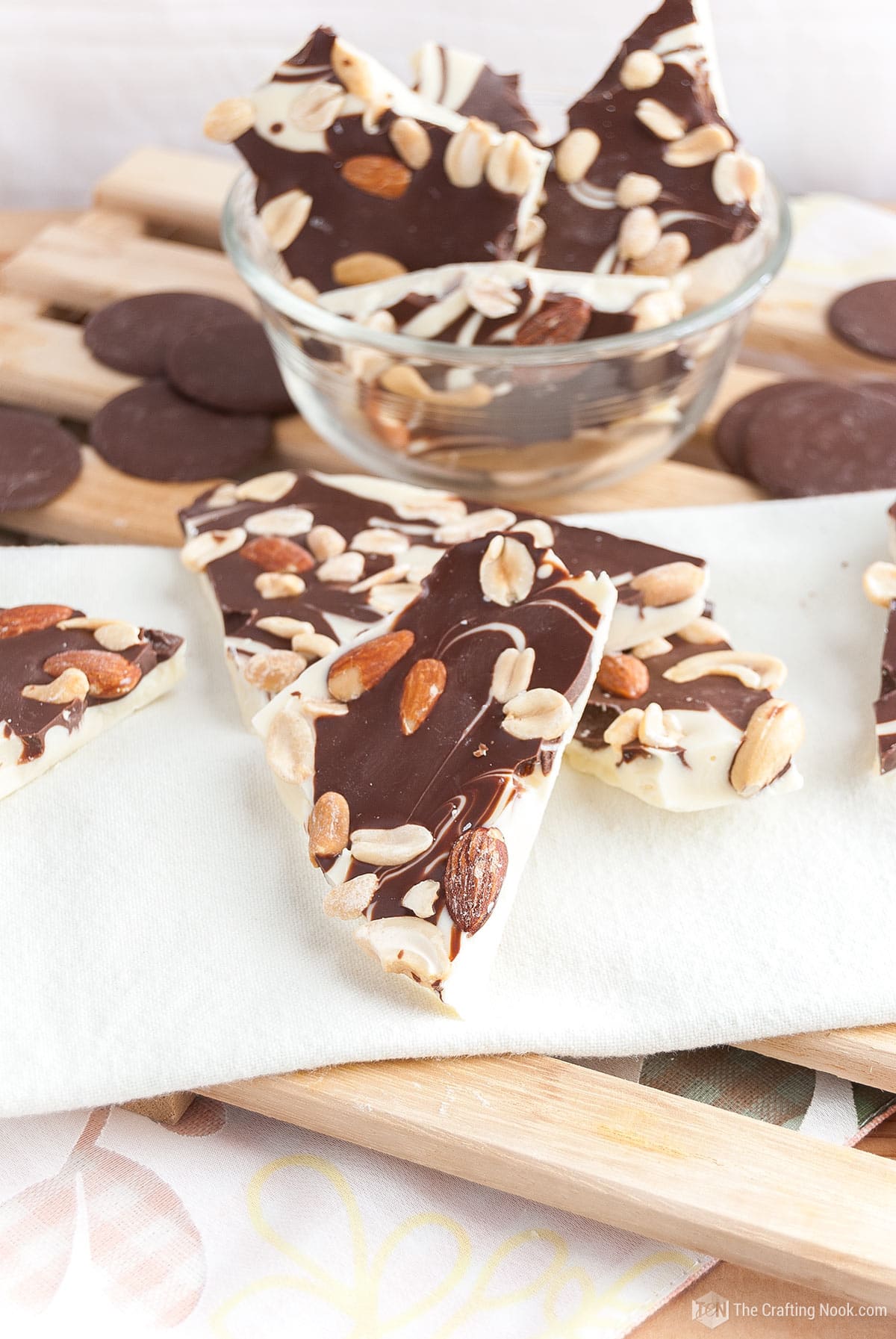 A closeup of the Double Chocolate Bark with Minex nuts broken in pieces on a towel on the table