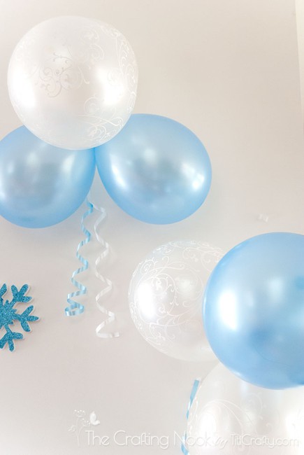 view of some withe an blue Frozen Themed Birthday Party balloons