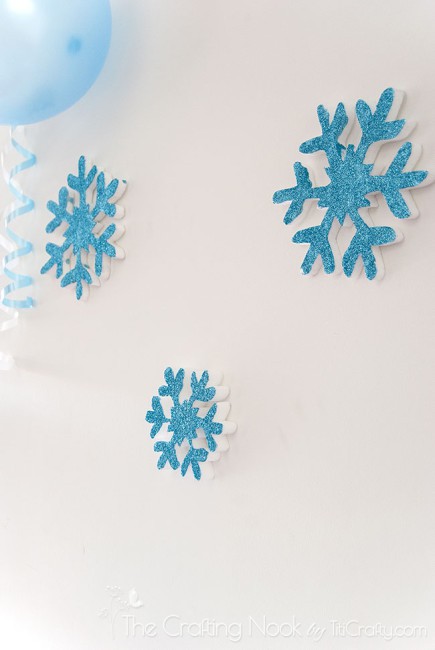 view of Frozen Themed Birthday Party snowflakes on wall