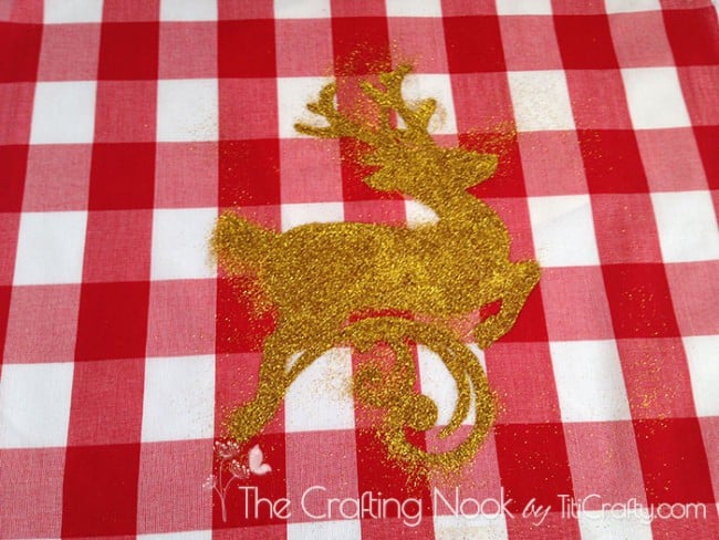 Clearer image of the shape drawn on the fabric after excess glitter has been removed
