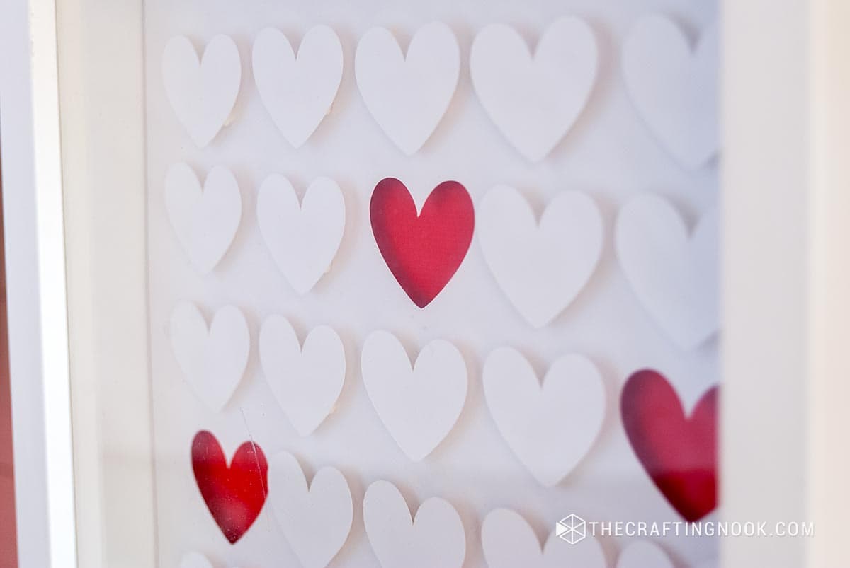 closeup of the layered hearts of the  Paper Heart Shadow Box