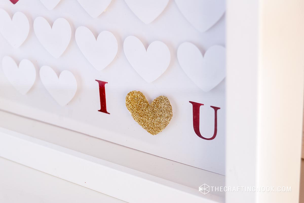 closeup of the I heart U section of the Paper Heart Shadow Box