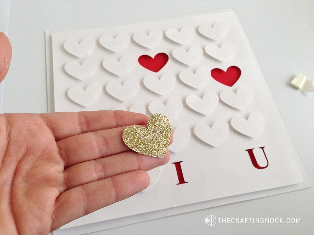 showing the heart with gold glitter to place it in the design