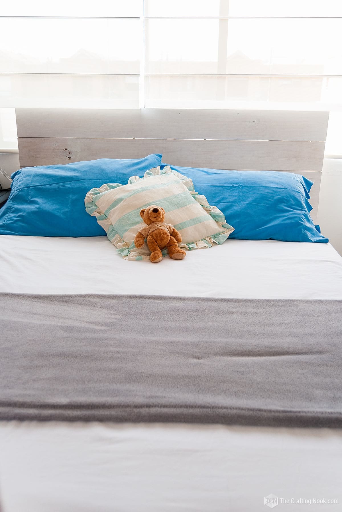 Front view of bed and Wood Plank Headboard