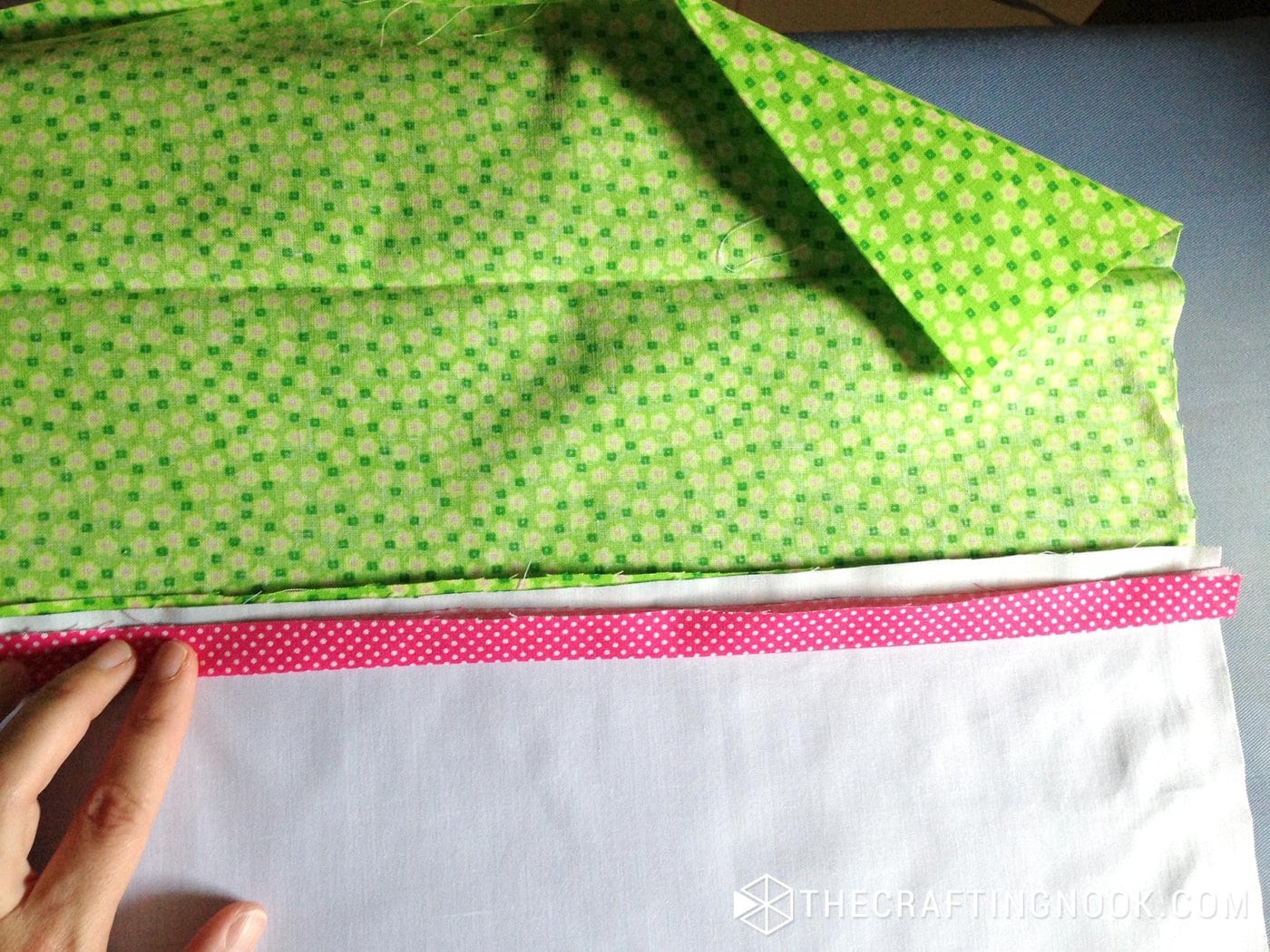 placing the fabrics together to be sewn
