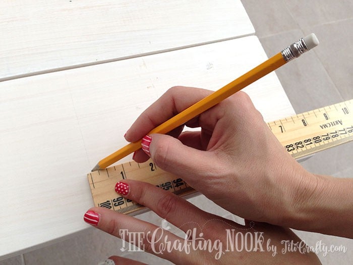 Image of taking the measurements with a pencil and marking it
