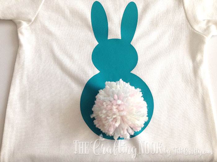 closer view of Pompom Bunny Tail Onesie is ready