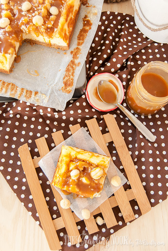 general view of the cheesecake, a slice of the cheesecake and a jar with extra caramel sauce