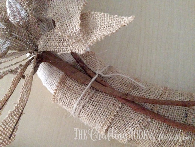 closer view of decoration of the rustic Burlap Christmas Wreath