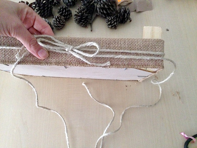 view of second layer of twine in fruit crate