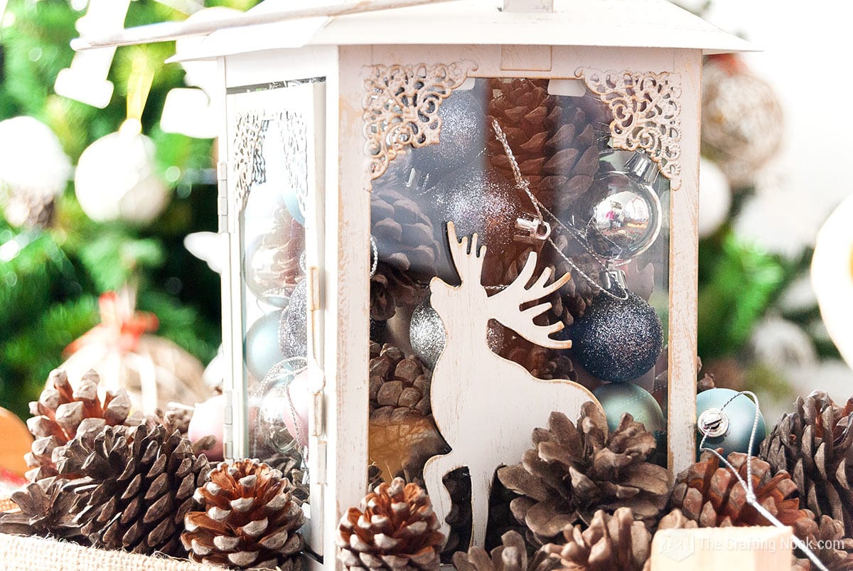 close up of the lantern in the center of the Rustic DIY Christmas Table Centerpiece