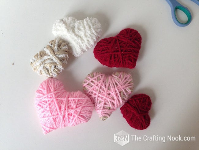 DIY Rustic Valentine Wreath With Yarn And Hearts - The Crafting Nook