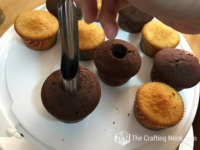 close view of the cupcakes with a hole in the middle made with the help of an apple corer
