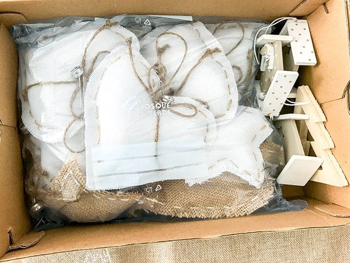 Delicate ornaments stored in separate bags inside a box