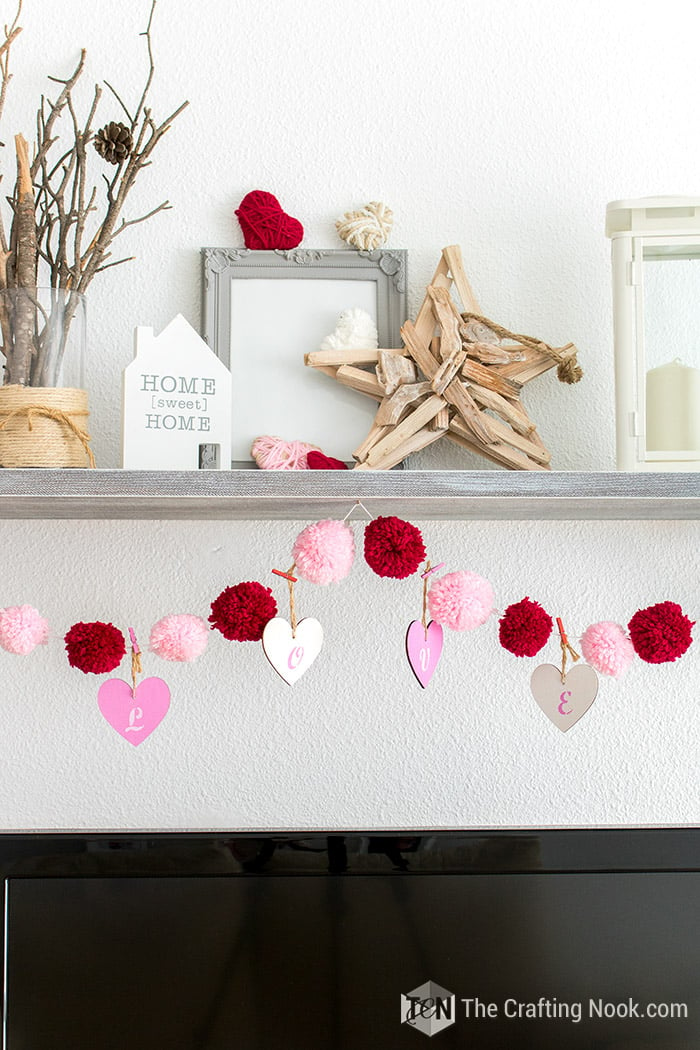 A more general view of the mantel with the pretty diy Pom Pom Garland. 