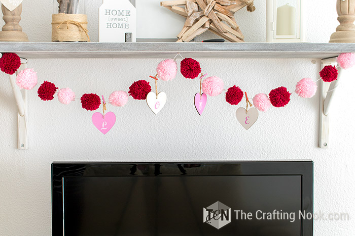 The Pom Pom Garland installed on my mantel.