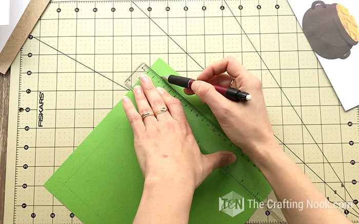 Tracing the inner lines on the green cardstock