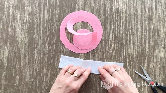 folding a strip of white felt