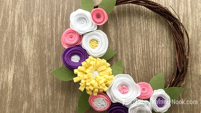 Testing the felt flower bouquet on the Rustic Spring Wreath.