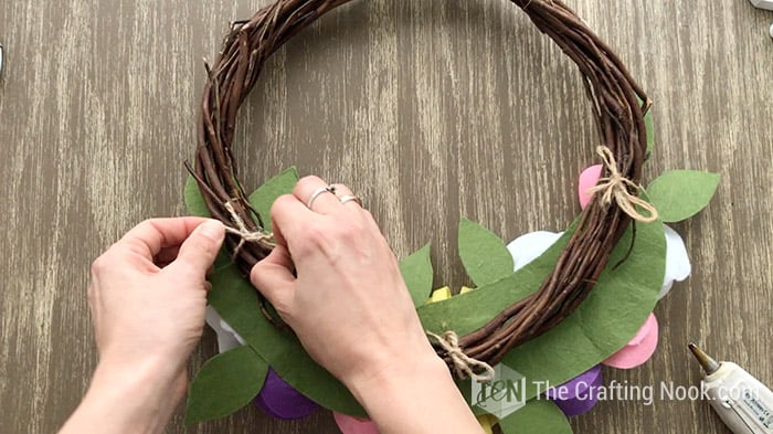 making a knot on the back of the wreath